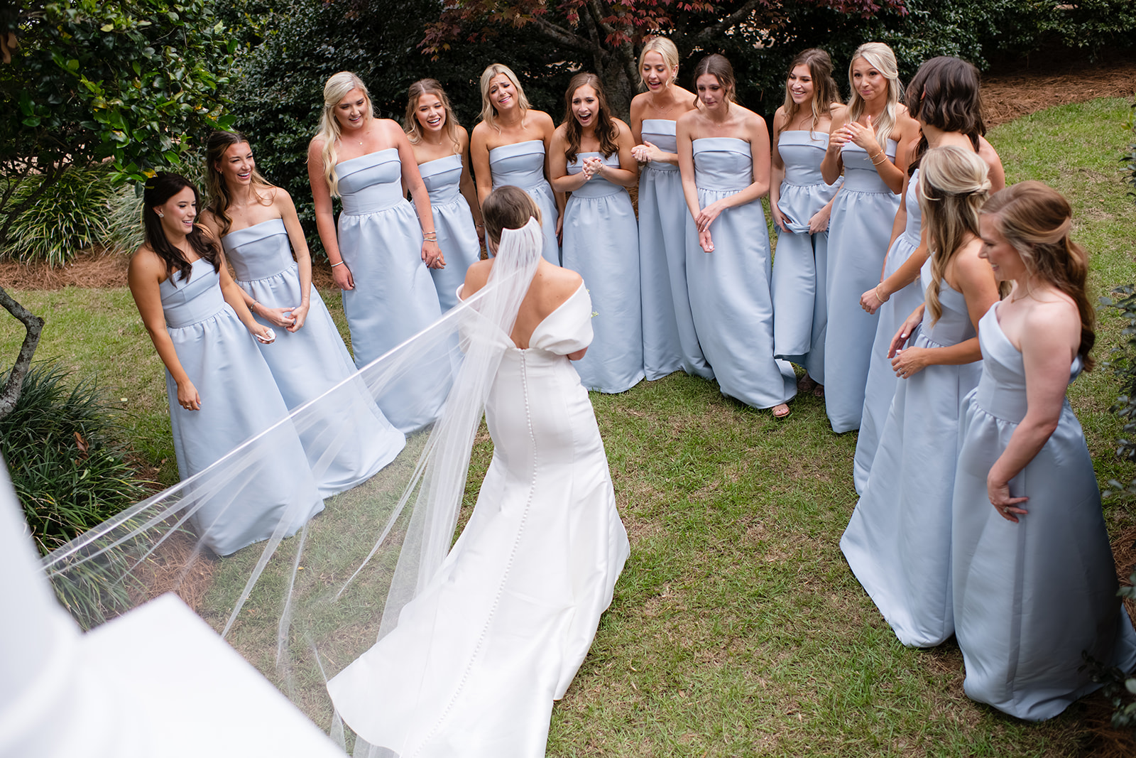 Bridesmaids dresses in pretty pastel shade of Blue with a simple silhouette that suits every body type and skin.